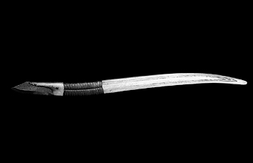 Fig. 11 A decorated, long-handled crooked knife. 