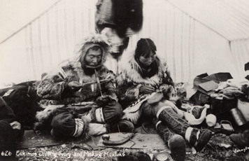 Fig. 9 Iñupiaq carver and seamstress at Port Clarence. Postcard, early twentieth century. 