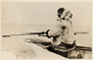 Fig. 3 ‘Point Barrow Native goes Whaling’. Iñupiaq man posing in the bow of an umiaq, holding a harpoon. 