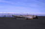 Fig. 9 Umiaqs on the beach, ready to be launched for the spring bowhead whale hunt.